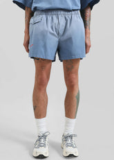JW Anderson Logo Print Shorts - Light Blue