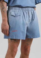 JW Anderson Logo Print Shorts - Light Blue