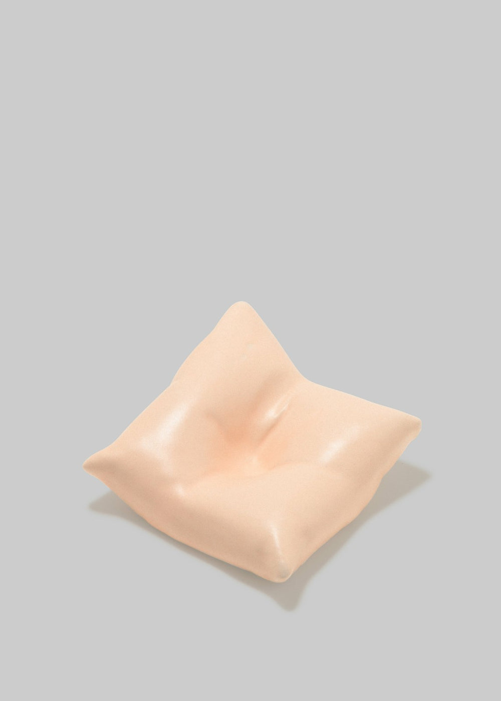 Completedworks Bumped II Ceramic Cushion - Matte Pale Peach